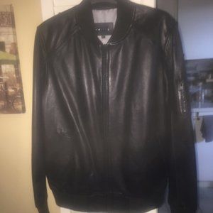 Danier black leather jacket - never worn